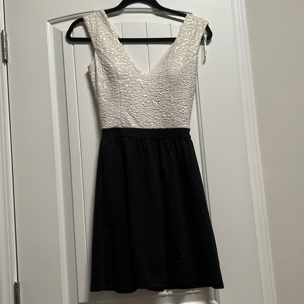Candies shimmer cream top black dress